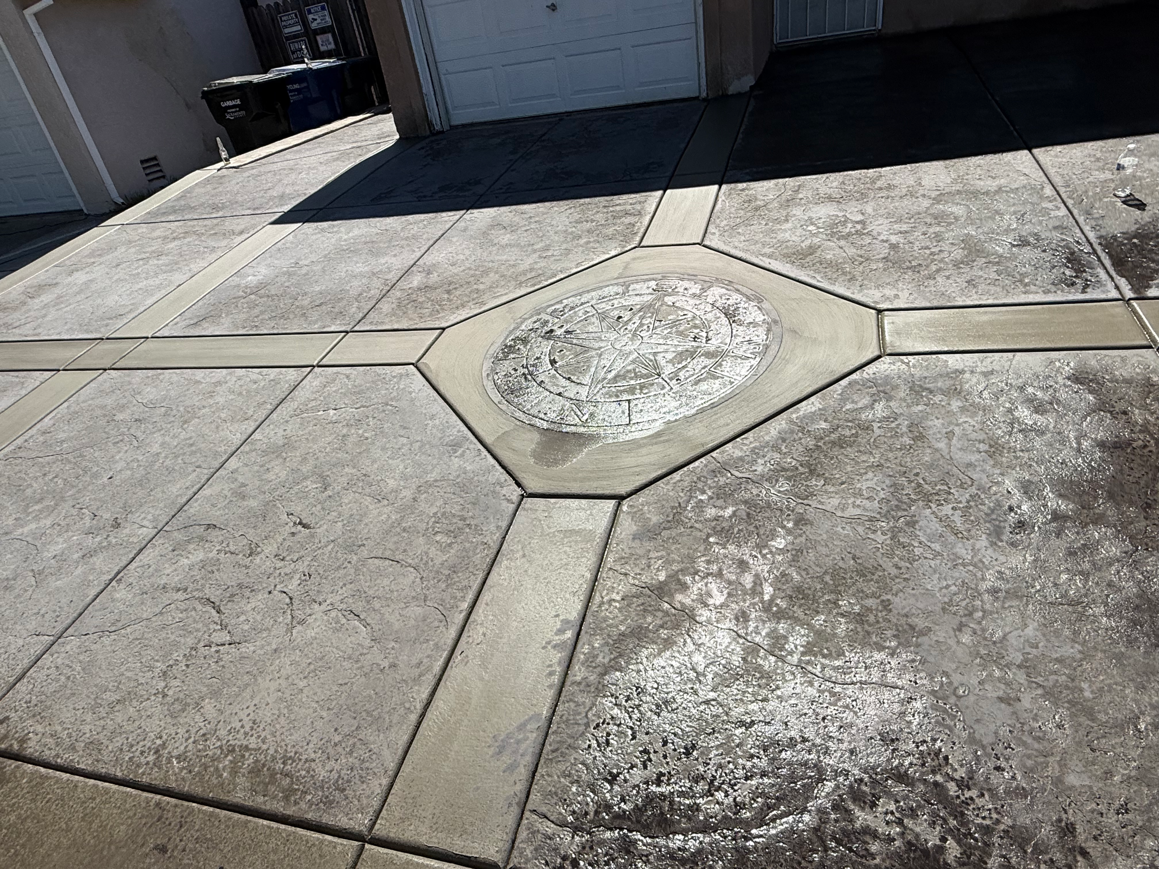 Stamped Driveway with Compass Rose Inlay